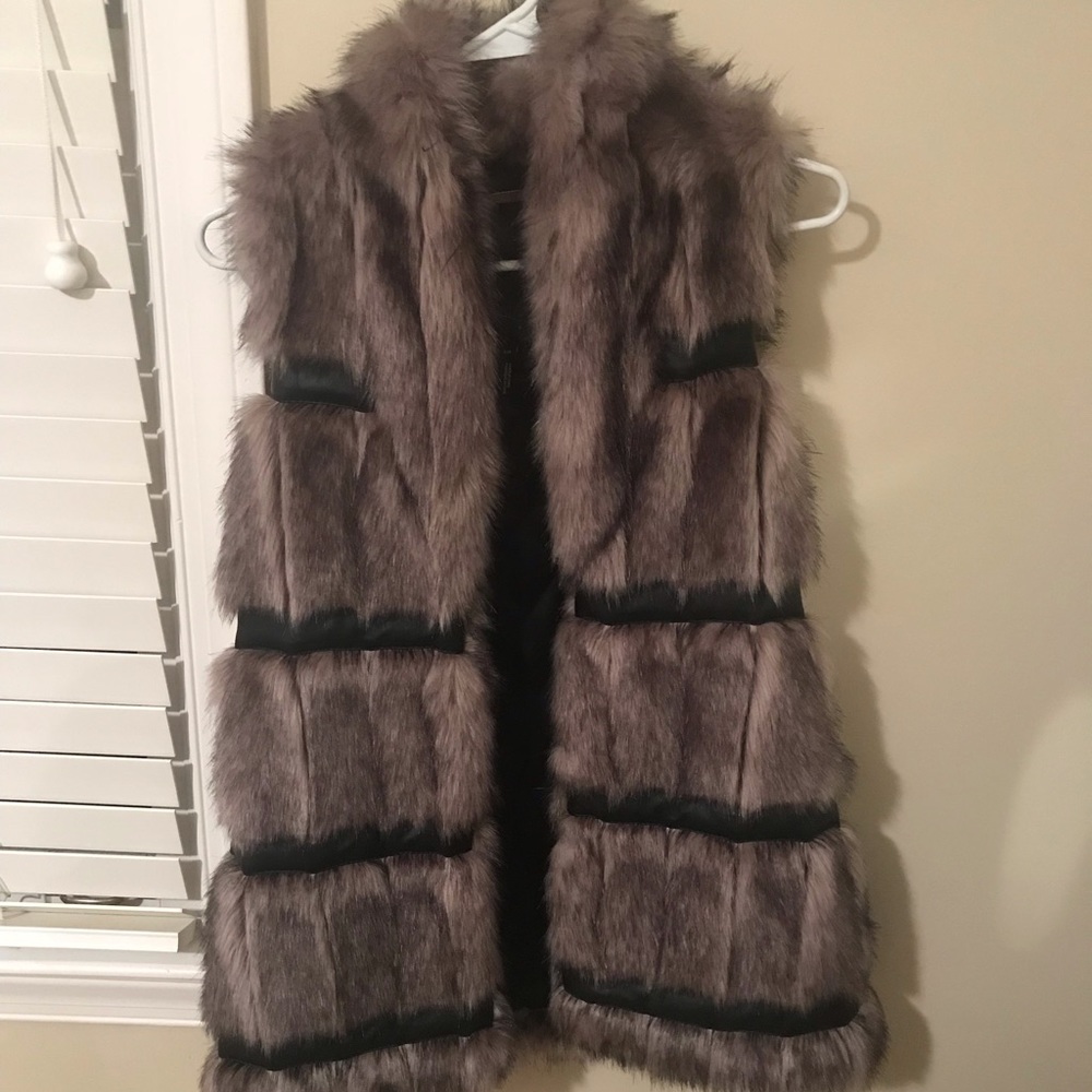 Faux fur vest with leather detail